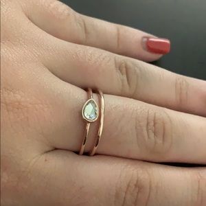 Double band ring with tear drop stone